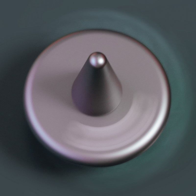 Precision spinning top in motion
