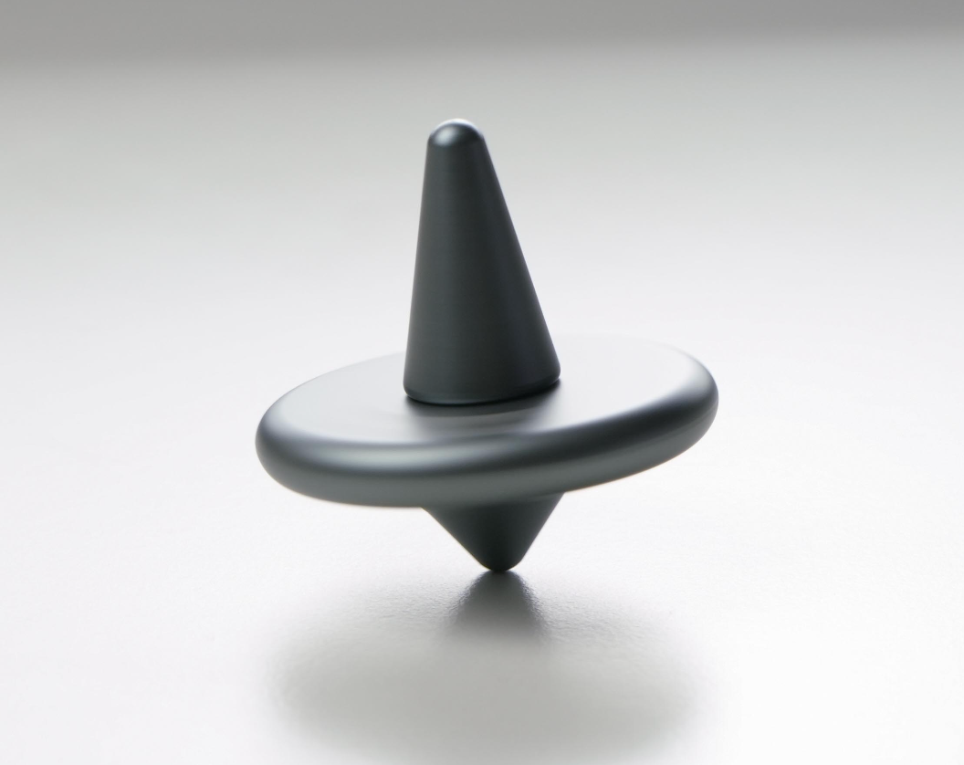 ST-01 spinning top assembled product shot showing anodised aluminium design